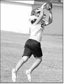Springlake-Earth’s wide receivers work on their routes and catching passes, during the first week of two-a-days this past week. (Staff Photo by Derek Lopez)