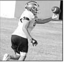 Springlake-Earth’s wide receivers work on their routes and catching passes, during the first week of two-a-days this past week. (Staff Photo by Derek Lopez)