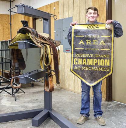 Hayden Hardin won Reserve Grand Champion Ag Mechanics for his Saddle Rack that he crafted. (Photo by MD Creations)
