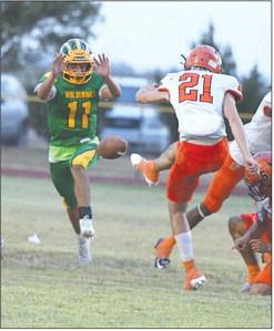 Springlake-Earth’s Jacob Alvarez, blocks the kick from Paducah, during the Wolverines’ home loss to the Dragons last Friday at Wolverine Stadium. (Staff Photo by Derek Lopez)