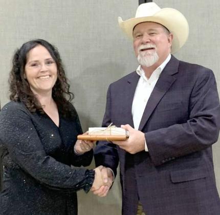 DISTRICT CONSERVATIONALIST OFTHE YEAR -- NRCS District Conservationist with Lamb Co. SWCD, Brenda May, was awarded the District Conservationist of the Year by Chad Reed, Assistant State of Field Operations Zone 1 NRCS. The awards banquet was held in Plainview on Tuesday, May 6, 2025. (Submitted Photo)