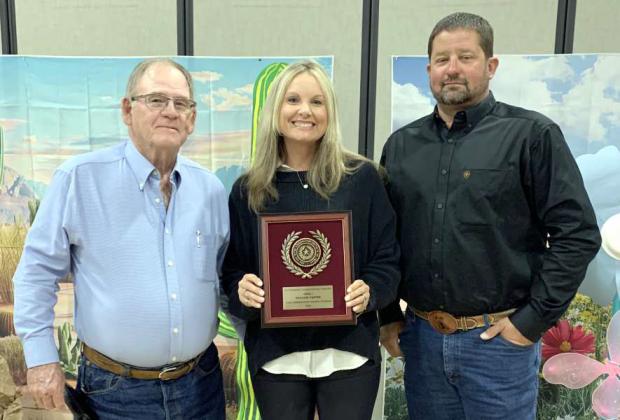 BREANNE CARTER -- 2nd Grade Math and Science Teacher at Sudan ISD won 1st Place Area I Conservation Teacher Award. Shown left to right: Roy Thompson- Lamb Co. SWCD Board member, Breanne Carter, and Jason Spangler- Lamb Co. SWCD Board chairman. (Submitted Photo)