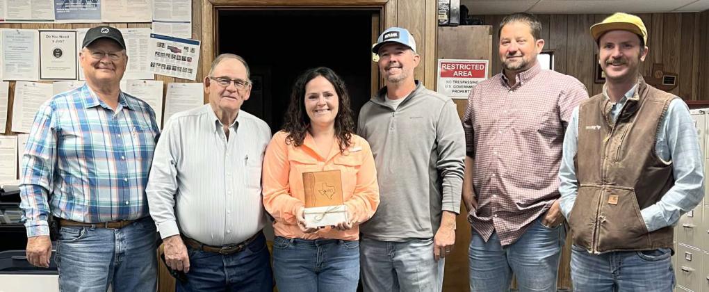 BRENDA MAY is shown with the Lamb Co. SWCD Board members with her award as NRCS District Conservationist of the Year. Left to right are: Larry Hobratschk- Lamb Co. SWCD Board Secretary, Roy Thompson- Board member, Brenda May- NRCS District Conservationist of the Year, Jason Spangler- Lamb Co. SWCD Board Chairman, Jeff Edwards- Lamb Co. SWCD Board Vice-Chairman and Trevor Spain-Lamb Co. Board member. (Submitted Photo)