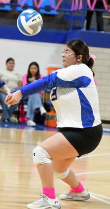 Olton senior, Rebekka Lopez, digs out a ball, during the first set of the Fillies’, 3-0, victory over Post on Saturday for senior day. (Staff Photo by Derek Lopez)