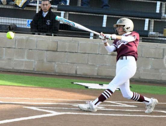 Littlefield junior, Brinley Acevedo, gets a solid hit, during the Lady Cats’, 11-8, road loss to Lamesa on Tuesday. (Staff Photo by Derek Lopez)