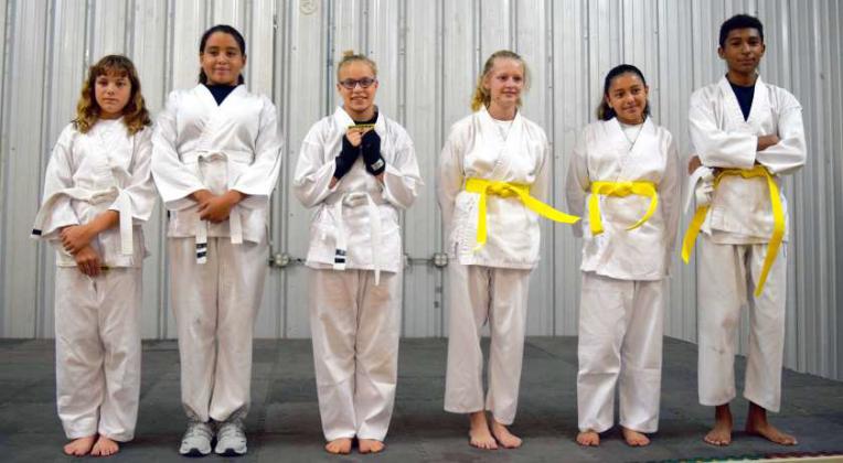 The 11 to 16 year old group passed their tests and were recognized for advancement during the Belt ceremony for the Littlefield Martial Arts Academy. Left to right- Emily Gandara, Allison Stamps, Ayden Arredondo, Aryana G. Rusio, and Isabel Clark. (Submitted Photo)