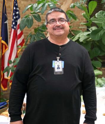 Michael Vargas received recognition for his 10 years of dedication to the Lamb Healthcare Center at their Holiday Luncheon on Friday, December 20, 2024. (Photo by Ann Reagan)