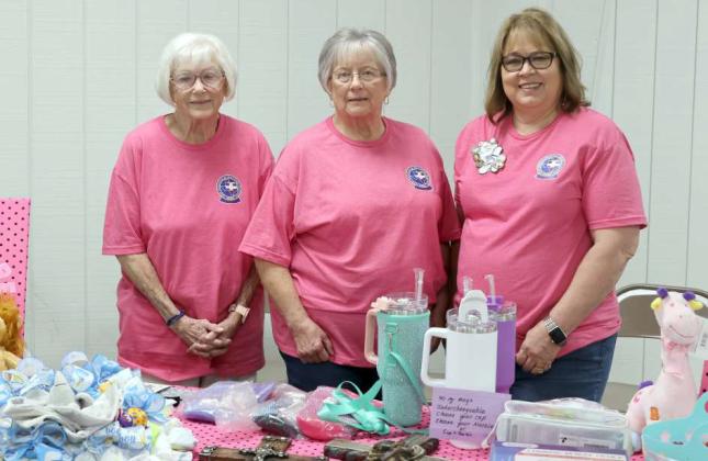 Volunteers with the Lamb County Auxiliary served as greeters, and displayed items offered in the Auxiliary Gift Shop in the Lamb County Healthcare Center Health Fair held at the Ag Center in Littlefield on Saturday, August 24, 2024. (Photo by Ann Reagan)