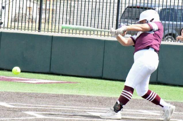Littlefield’s Natalia Sanchez hits a shot to third and ends up on second after an error by the first baseman, as the Lady Cats run-ruled the Bobbies on Saturday, 15-0. (Staff Photo by Derek Lopez)
