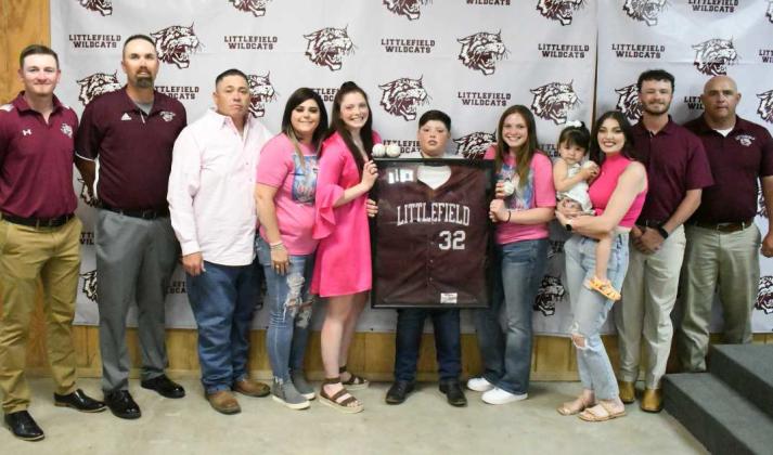 The family of 2023 senior Malachi Frausto was honored with his framed baseball jersey by the Littlefield Baseball Coaching Staff at the 2023 Littlefield Athletic Banquet on Monday. Shown is the family of Malachi, with the 2023 Basball Coaching Staff. (Staff Photo by Derek Lopez)