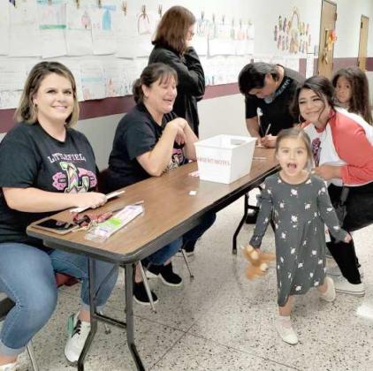 Guests of the Littlefield Primary Family Reading Night that was held on Monday, Sept. 27 got to sign up for door prizes. (Submitted Photo)