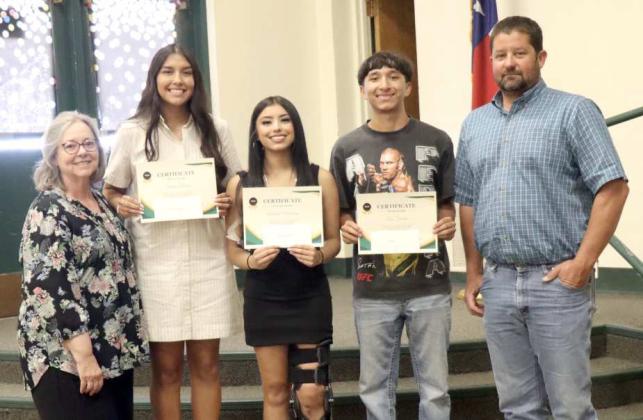 The following students received awards at the Springlake-Earth Awards Assembly held at the Springlake-Earth Auditorium on May 16th. (L-R): Janice Warren-Springlake-Earth ISD Language Arts Teacher, Hannah Alvarez- 2nd Place Essay Winner-$75 cash award; Aabriella Villanueva- 1st Place Essay Winner$100 cash award, Luis Fuentes- 3rd Place Essay Winner-$50 cash award and Jason Spangler-Lamb Co.SWCD Board Chairman. (Submitted Photo)