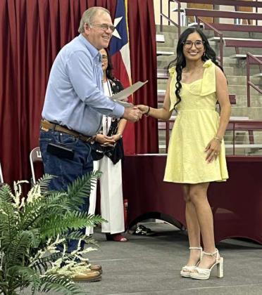 Roy Thompson-Lamb Co. SWCD Board Member presents Brinley Acevedo-1st place Scholarship Award Recipient $1000 (Littlefield) at the LHS Award ceremony held at the Littlefield High School gymnasium on Tuesday, May 20,2025 at 6 p.m. (Submitted Photo)