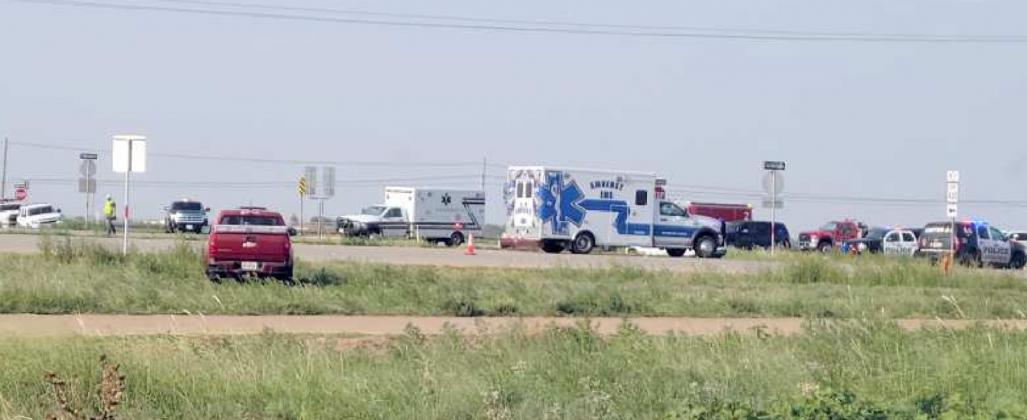 THIS WAS THE SCENE at the intersection of U.S. Hwy 84 and Loop 430 in Littlefield, following a threevehicle crash shortly before 5 p.m. Tuesday, July 13, 2021. The crash resulted in the deaths of the driver of a Honda Accord passenger car, and his 2-year-old daughter, who had been riding in an approved safety seat in the left rear seat of the car. The driver’ wife was hospitalized in Lubbock, and is reported to be in critical condition. See story for full report. (Submitted Photo)