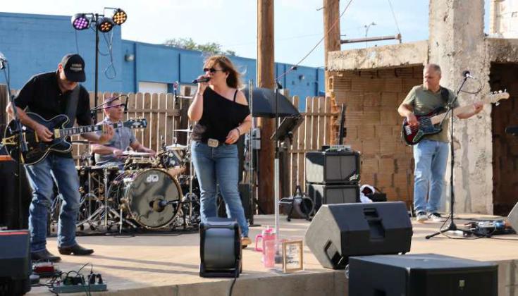 The Legal Limit Band performed at the Pocket Park on Phelps Ave. on Friday night, during the Free Block Party that kicked off the Flatland Music Festival Weekend. (Photo by Ann Reagan)