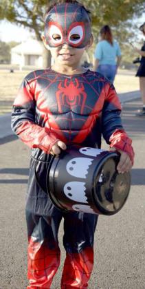 Jaiden Sierra swung right in to Lamb Country Sheriff’s Office Trunk-or-Treat on dressed as Spiderman. (Photo by Rhode Duenas)