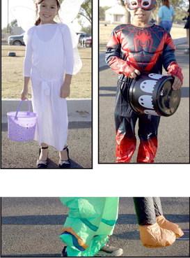 Kingston Nichols plays pumpkin ring toss in his alien costume at the Lamb Country Sheriff’s Office Trunk-or-Treat on Saturday, Oct. 26. (Staff Photo by Rhode Duenas)