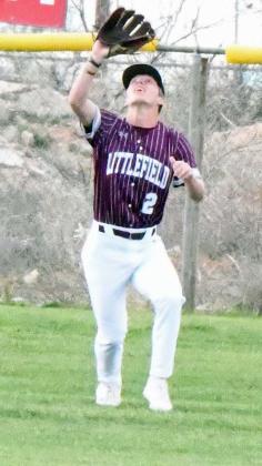 Littlefield center fielder, Major McNeese, catches a fly ball in rightfield l and fires a rocket to third for a double play, during the Wildcats’ extra inning loss to the Mustangs in Denver City on Tuesday. (Staff Photo by Derek Lopez)