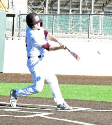 ROPING THE BALL-Littlefield senior, Blake Green, roped a double to the left field fence in the bottom of the first inning to give the Wildcats a base runner, during their victory over Tulia on Tuesday at Wildcat Field. (Staff Photo by Derek Lopez)