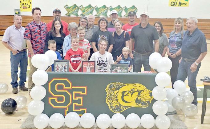 WRECK EM - Springlake-Earth senior, Taytum Goodman, signed her Letter of Intent last Wednesday to continue her running and academic career at Texas Tech University. She signed during a ceremony held in Wolverine Gym surrounded by family, friends and classmates. (Staff Photo by Derek Lopez)