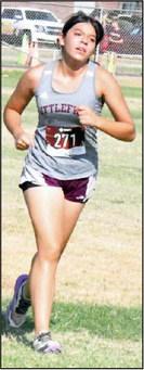 Littlefield’s Jazmin Almance competes at the Littlefield Invitational last Saturday. (Staff Photo by Derek Lopez)