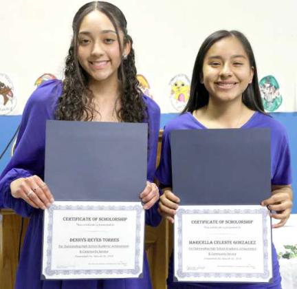 The Senior Scholarship Awards for 2024 were awarded to (left to right) Amherst Seniors Dennys Reyes Torres and Maricella Celeste Gonzalez. (Photo by Ann Reagan)