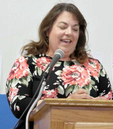 Jennifer Sawyer President of the Amherst Chamber of Commerce welcomes guests of the Amherst Chamber of Commerce Banquet on Tuesday, March 26, 2024. (Photo by Ann Reagan)