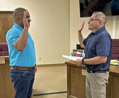 Jason Rudy Ayala was appointed to the seat of City Council Member-District 2, during the regular City Council meeting on Tuesday, May 27th. Shown is Ayala taking the Oath of Office from City Secretary, Otoniel Gonzalez. (Submitted Photo)