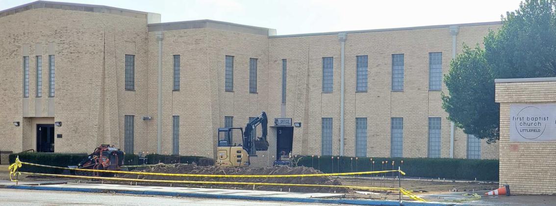 LANDSCAPING - First United Baptist Church is getting some work done in front of their Church Building. (Staff Photo by Derek Lopez)