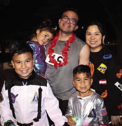 Dr. Rodrigues of LHC Family Medicine Celebrates with his family after the successful Zombie Run he initiated as part of the Pumpkin Trail Celebration held at Crescent Park in Littlefield, TX on Saturday October 25, 2025. (Photo by Ann Reagan)