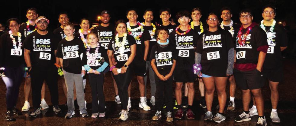 Participants of the first Zombie Run congratulate their finish at Crescent Park in Littlefield, TX on October 25, 2025. Dr. Rodriguez of the Littlefield Medical Center was instrumental in organizing the event. (Photo by Ann Reagan) Jubilant runners shout “We made it” as they finish the first Zombie Run during the Pumpkin Trail Celebration held at Crescent Park in Littlefield, Texas on Saturday October 25, 2025. (Photo by Ann Reagan)