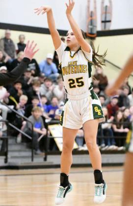 Springlake-Earth senior, Emma Samaron, pulls up for a jumper from the free-throw line, during the first half of the Lady Wolverines, 5540, Bi-district play-off loss to the Lady Mustangs on Tuesday at Bushland High School. (Staff Photo by Derek Lopez)