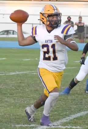 Dominic Gaitain looked for an open receiver in a 53-6 Anton loss to the Whiteface Antelopes in UIL high school six-man football action last Friday in Whiteface. The Bulldogs are back in Anton Friday, hosting the Spur Bulldogs at 7:40 p.m. (Photo by Jay Kelley)