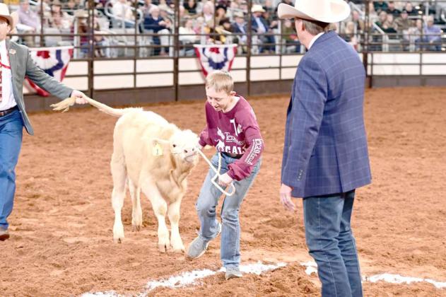 Youngest Calf Scramble competitor, Ryan Muller, 14-years old, places third in the event that took place in Fort Worth in February. (Submitted Photo)