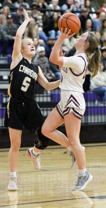 Littlefield senior, Kennadi Hanlin, goes up strong for a lay-up, during the second half of the Lady Cats’ Area round loss to Canadian on Friday at Canyon High School. (Staff Photo by Derek Lopez)