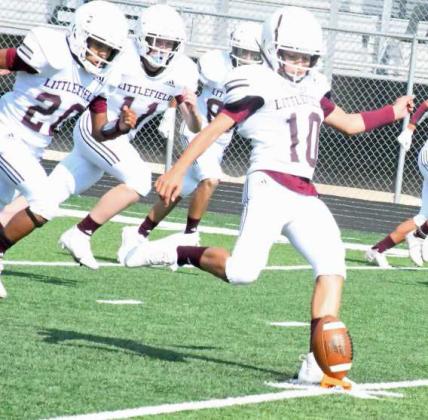KICKING OFF – Littlefield’s Nate Castaneda (10) kicks off after a Wildcat touchdown on Thursday in their season-opener on the road against Muleshoe. (Staff Photo by Derek Lopez)