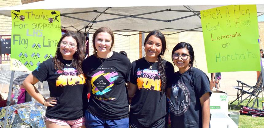 left to right-Brittany Abeyta, Caytlin Black, Sophie Garcia, and Cassie Caudillo were working the Flag Line’s fundraiser for the Wildcat Band Block Party held on Saturday, August 19, 2023. (Photo by Ann Reagan)