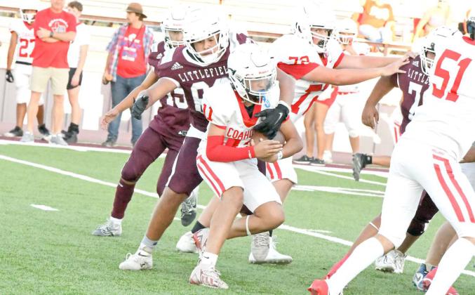 Littlefield’s Elijah Rodriguez (62), gets his paw on the Coahoma ball carrier, as he takes him down for a loss, during their, 44-6, victory on Thursday. (Staff Photo by Derek Lopez)