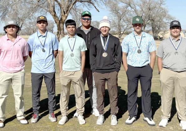 The Springlake-Earth Wolverines’ varsity golf team placed second overall at the Olton Tournament on Wednesday, with Froylan Agundiz placing third individually and Tyler Tanaro placing second individually. (L-R): Bryan Longoria, Jacob Alvarez, Nathan Ramos, Coach Juan Salas, Froylan Agundiz, Tyler Tanaro and Ethan Mosqueda. (Submitted Photo)