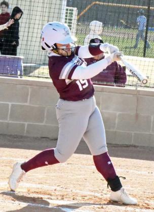 Littlefield’s Natalia Sanchez, sends a two-run homerun over the center field fence to put the Lady Cats up, 3-0, in the top of the first inning of the Lady Cat’s district-opener against Dimmitt on Wednesday. (Staff Photo by Derek Lopez)