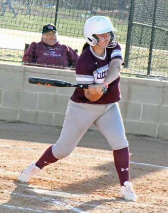 Littlefield’s Brianna Aleman, sends a two-run homerun over the left field fence to put the Lady Cats up, 8-1, in the top of the second inning of the Lady Cat’s district-opener against Dimmitt on Wednesday. (Staff Photo by Derek Lopez)