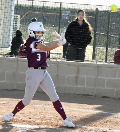 Littlefield’s Cali Saldana, doubles off of the top of the center field fence to lead off the top of the second inning of the Lady Cat’s district-opener against Dimmitt on Wednesday. (Staff Photo by Derek Lopez)