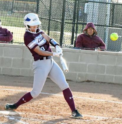 Littlefield’s Myli Hernandez, goes opposite field for a triple to right field in the top of the second inning of the Lady Cat’s district-opener against Dimmitt on Wednesday. (Staff Photo by Derek Lopez)