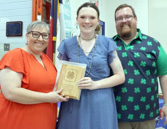 Valeree Harper received the Intermediate Parade of Champions award for 2025, presented by Brandon Albus and Kathy Lostroh. (Photo by Ann Reagan)