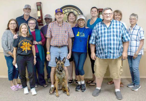 Mike Sea, Patriece Marshall, Robert Nichols, Nancy Moore, Megan Harrison, Barbara Hodges, Beverly Coleman, Olga Perez, Cristy Sea, Wayne Sullivan, Honey, PJ Sullivan and Blake Cate meet to organize Anton’s centennial on June 24, 2025. (Photo by Madison Vidales)