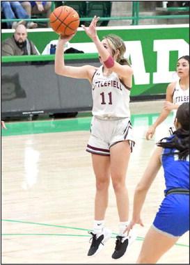 PULLING UP - Littlefield sophomore, Marysa Saenz (11), pulls up for a jumper in the lane, during the first half of the Lady Cats, Area round loss to Childress on Thursday in Floydada. (Staff Phtoo by Derek Lopez)