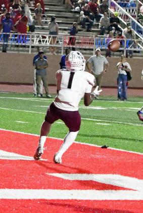 Littlefield’s, Eizeah Coleman (1), catches a slant pass in the endzone from Chip Green, during the fourth quarter of their, 71-70, loss to Coahoma on Friday on the road. (Staff Photo by Derek Lopez)