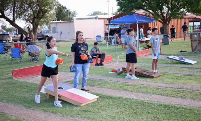 Competitors take part in the Cornhole Turnament that took palce Friday and Saturday evening at the 44th annual Olton Sandhills Celebration. (Photo by Wesley Quigley)