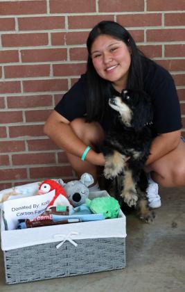 The winner of the Medium Dog Basket Donated by Kody Carson Farms, was Bella with her owner Alyssa Rivera at the Dog Show that took place on Friday at the 44th annual Sandhills Celebration. (Photo by Wesley Quigley)