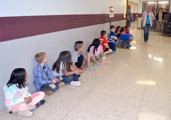 SECOND GRADERS WAIT TO SEE TEACHER